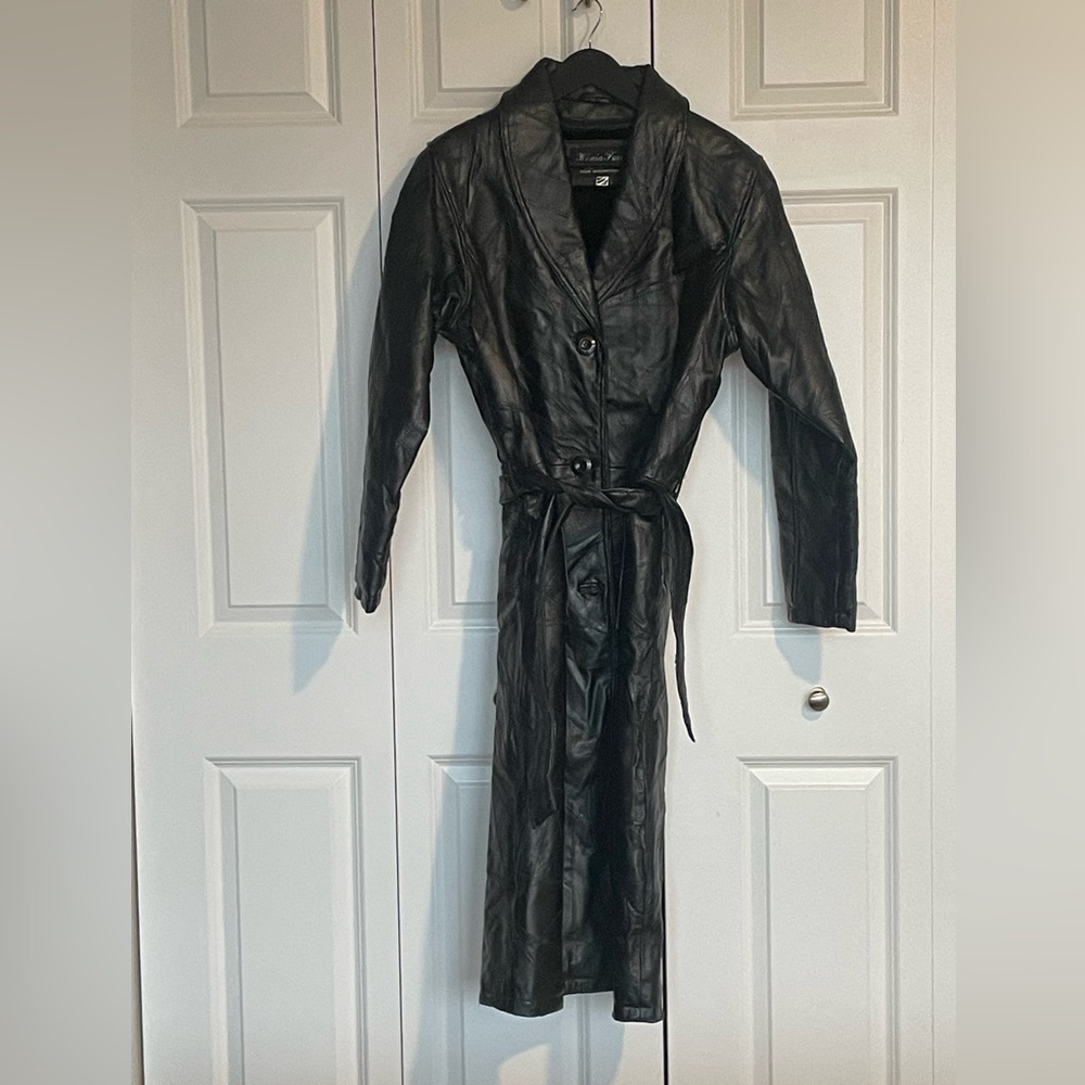 Elegant Black Leather Women's Trench Coat with removable fur lining.